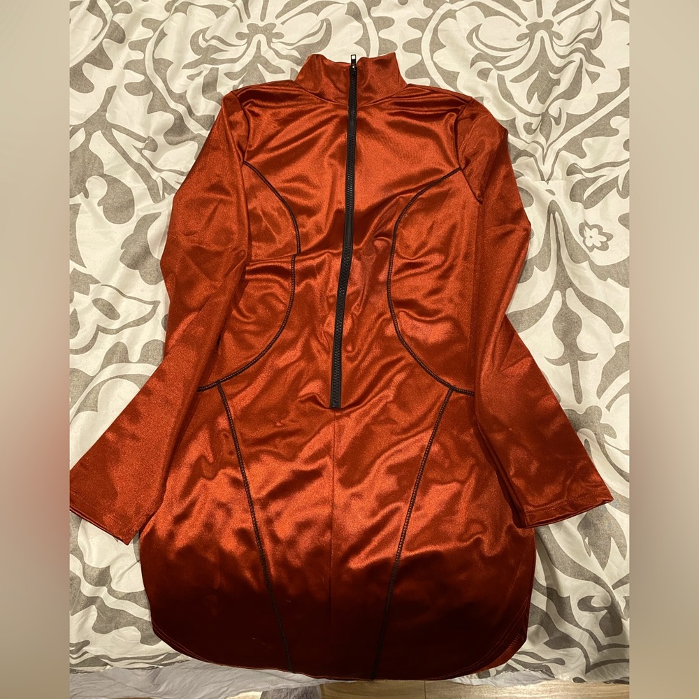 Girls dress worn once. Burnt orange color.
